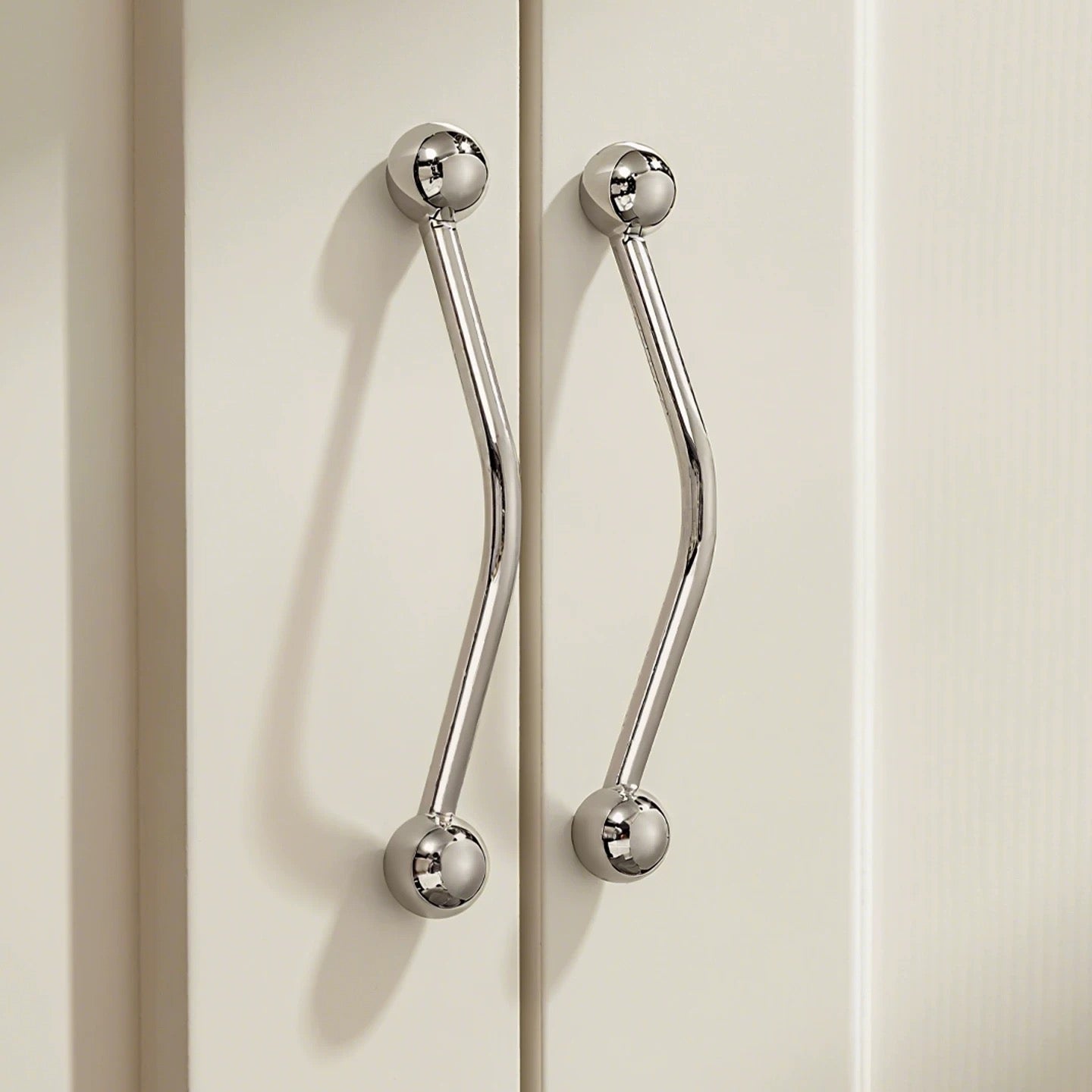 Shiny silver Nordic kitchen cupboard pulls made