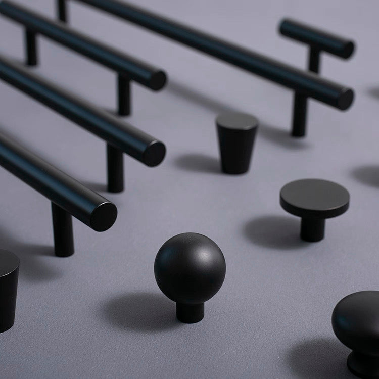 Set of black round drawer knobs and kitchen bar pulls for minimalist home decor