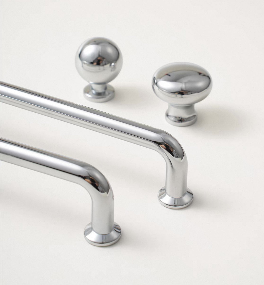 Polished nickel kitchen cupboard pulls and sphere knobs