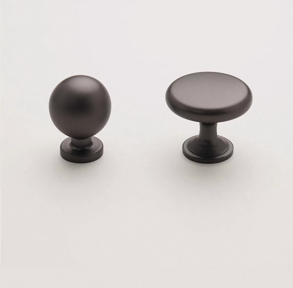 Globed knob and disc knob in dark gray finish