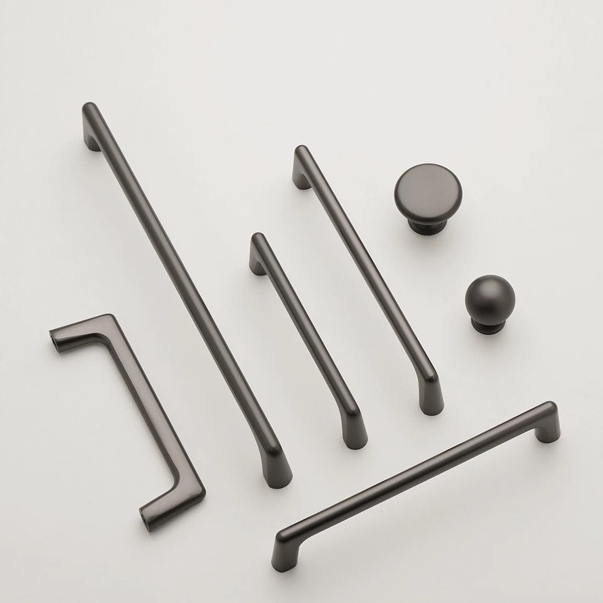 Set of dark gray cabinet d handles for modern minimalist home decor