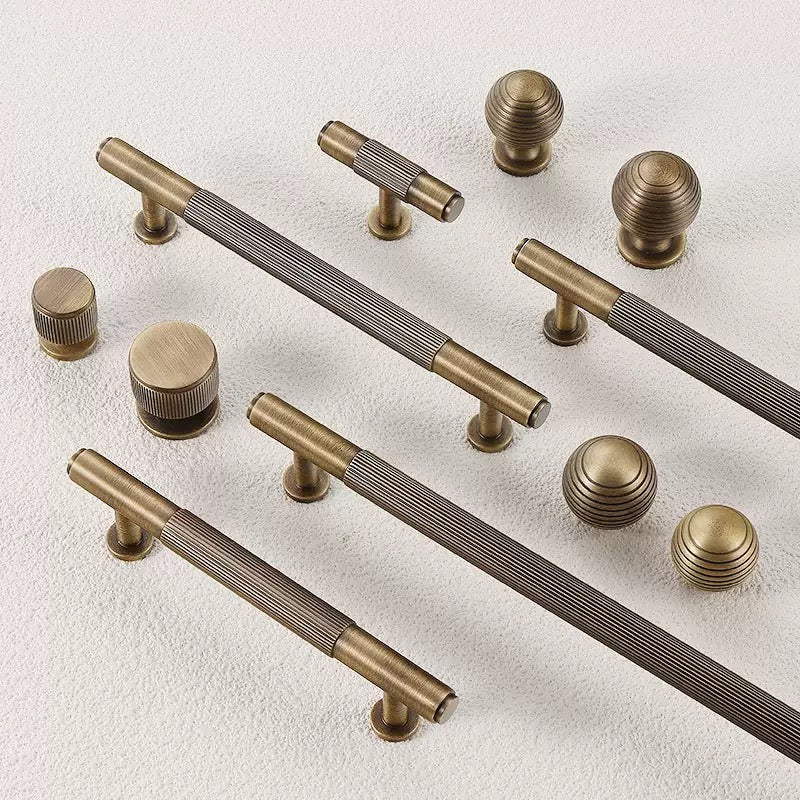 Antique bronze fluted bar handles and matching drawer knobs