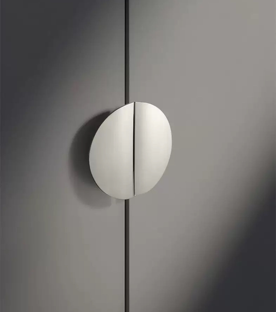 Brushed nickel semicircular cabinet handle