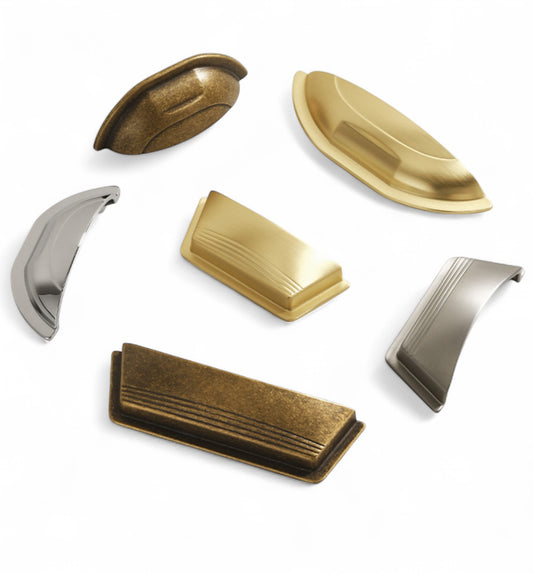 Drawer cup pulls in brushed brass, polished chrome, antique bronze and brushed nickel finishes