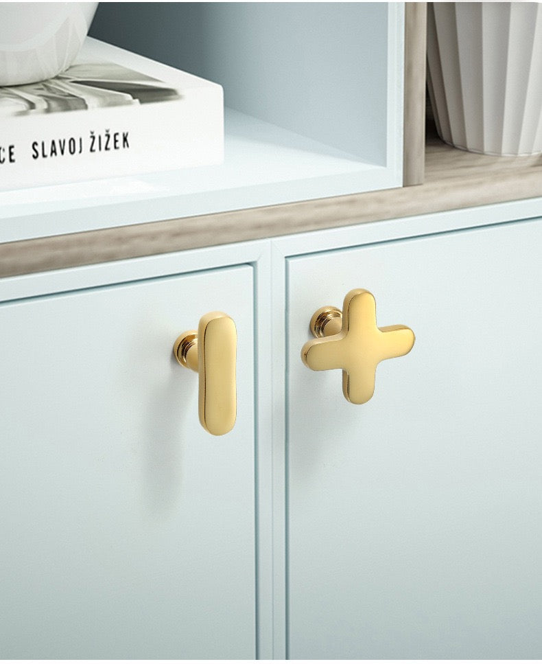 Brushed brass plus and minus symbol drawer knobs
