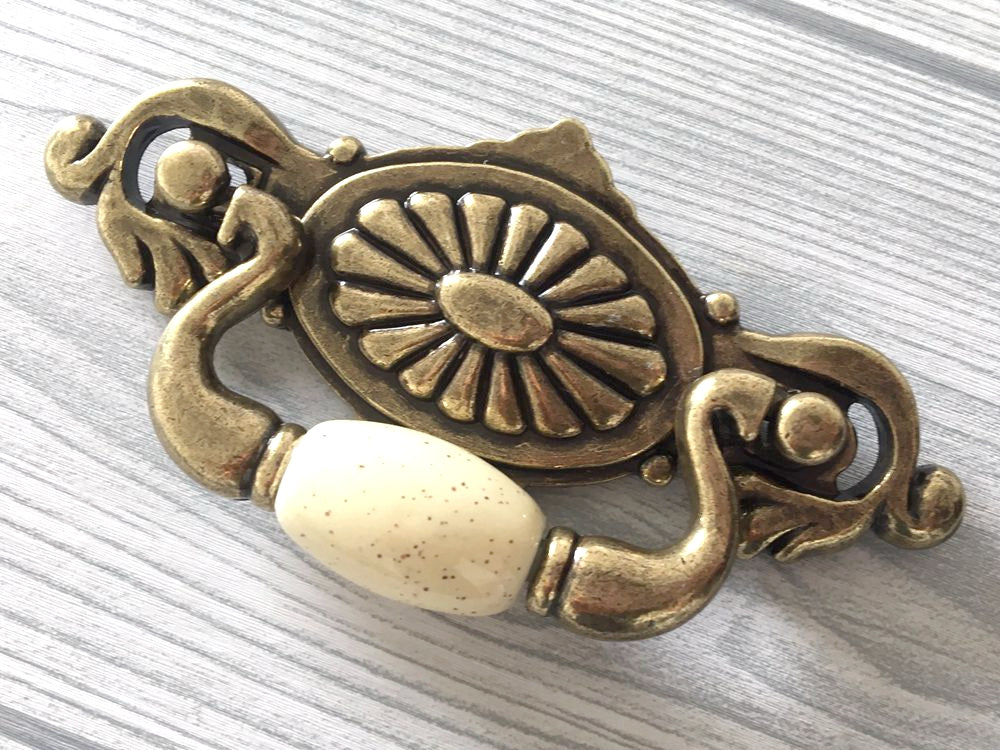 2-1/4" Drop Bail Dresser Pull, Swing Drawer Handle, Ceramic Knob, Ivory Cream Antique Bronze