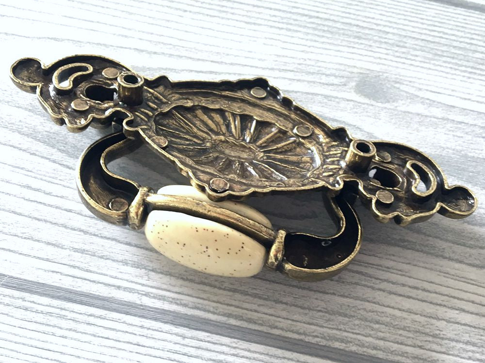 2-1/4" Drop Bail Dresser Pull, Swing Drawer Handle, Ceramic Knob, Ivory Cream Antique Bronze