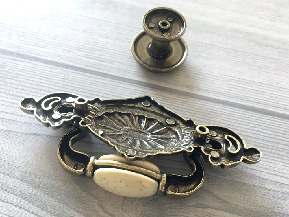 2-1/4" Drop Bail Dresser Pull, Swing Drawer Handle, Ceramic Knob, Ivory Cream Antique Bronze