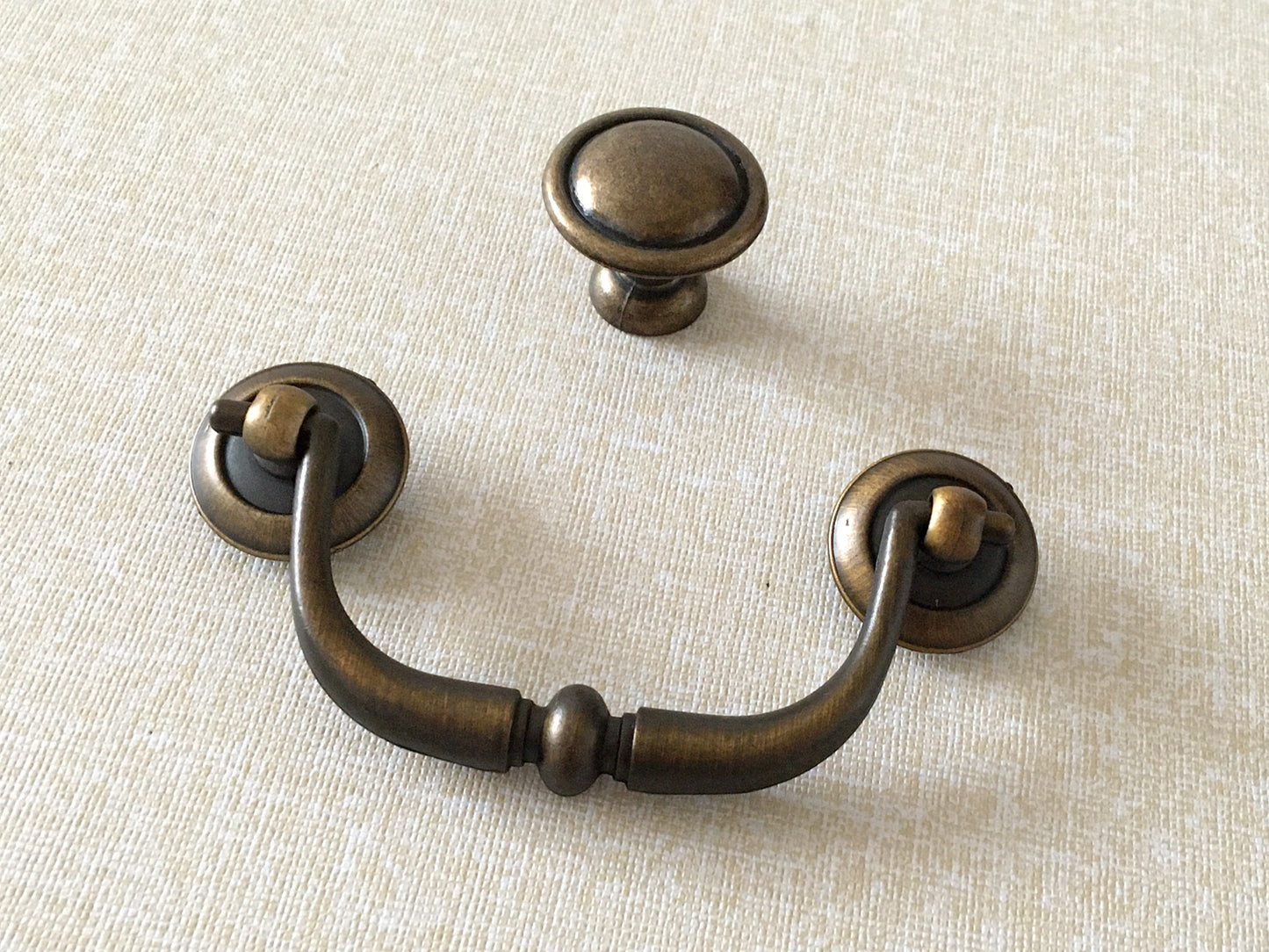 antique gold brass swing bail pull with matching round knob