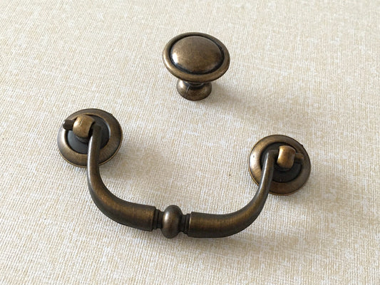 antique gold brass swing bail pull with matching round knob