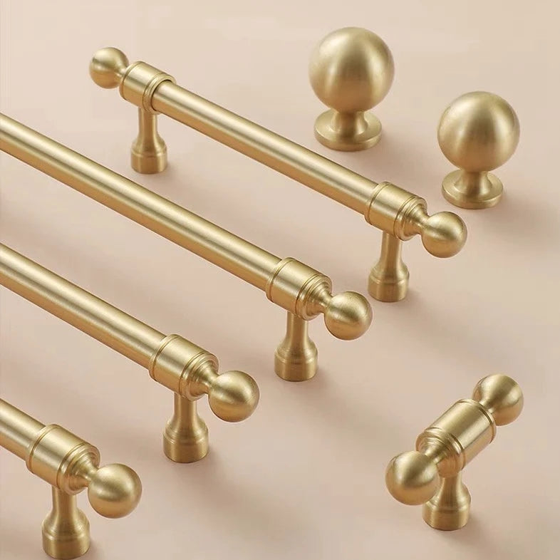 brushed brass drawer bar pulls with matching ball knobs