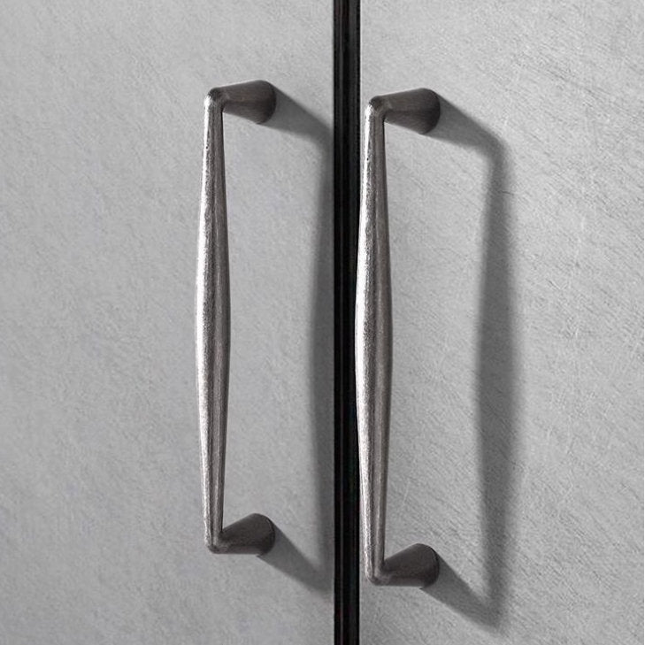 pewter drawer pulls on a cabinet
