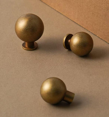 Warm Antique Brass Globed Cabinet Knobs - Vintage Look