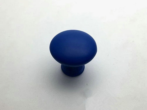 Blue cabinet knob on a white background