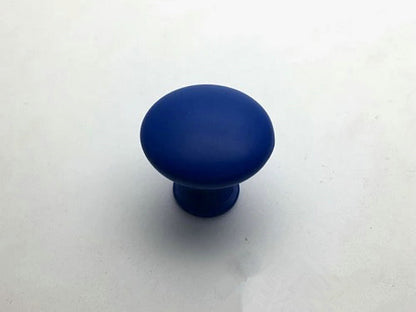 Blue cabinet knob on a white background