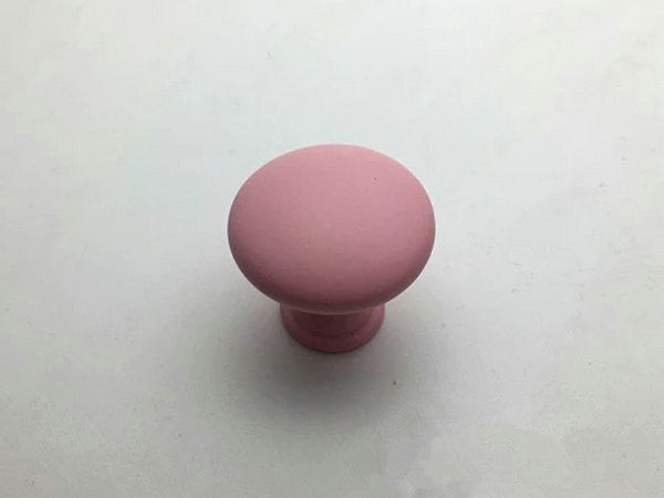 Pink knob on a white background
