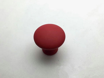 Red knob on a white background