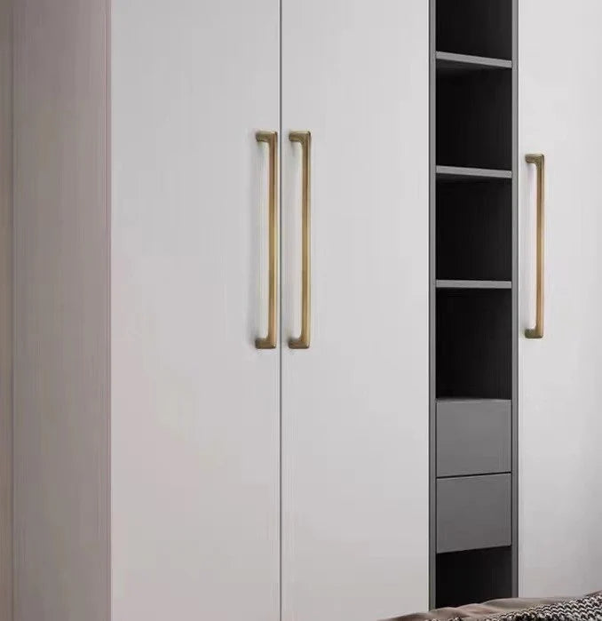 White wardrobe with antique bronze d  handles.