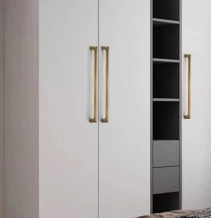 White wardrobe with antique bronze d  handles.