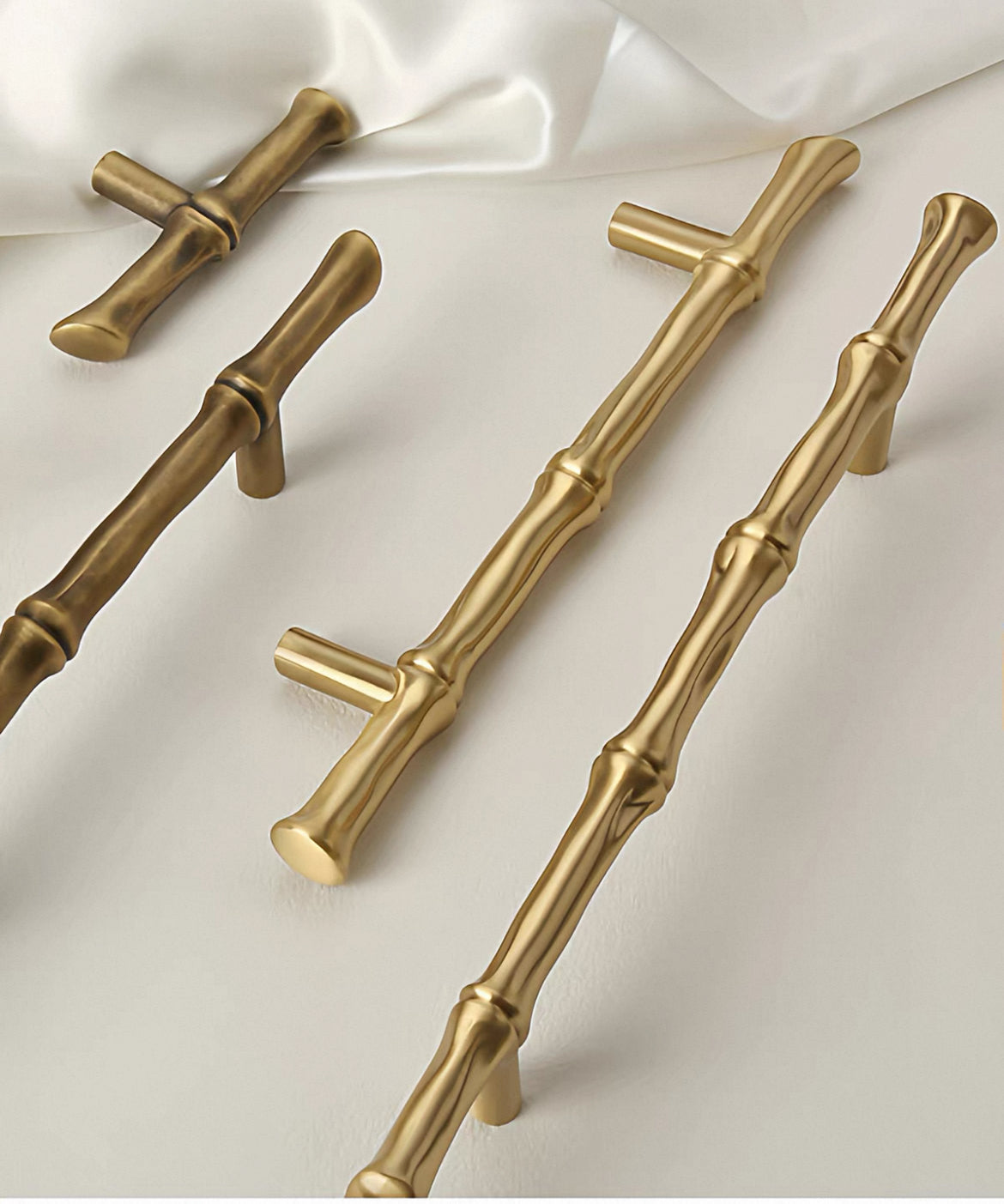 Decorative bamboo drawer handles in antique bronze and polished brass