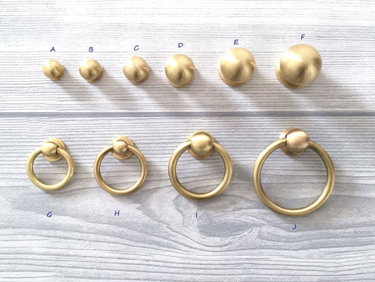 Brushed brass cabinet knobs with ring
