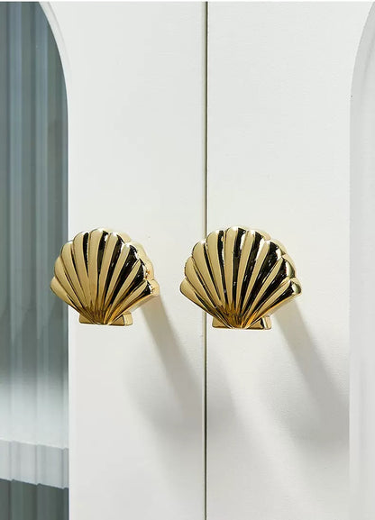 Polished gold brass scallop shell drawer knobs for contemporary decor