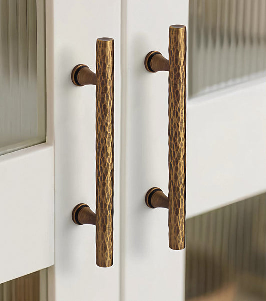 Stylish hammered aged bronze kitchen bar handles for transitional interiors