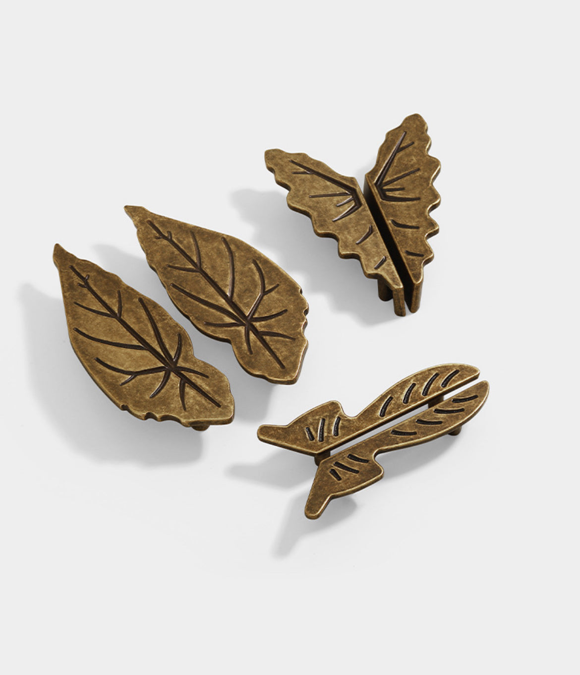 Antique bronze leaf kitchen cupboard handles with 2 1/2 inch and 3 3/4 inch hole spacing