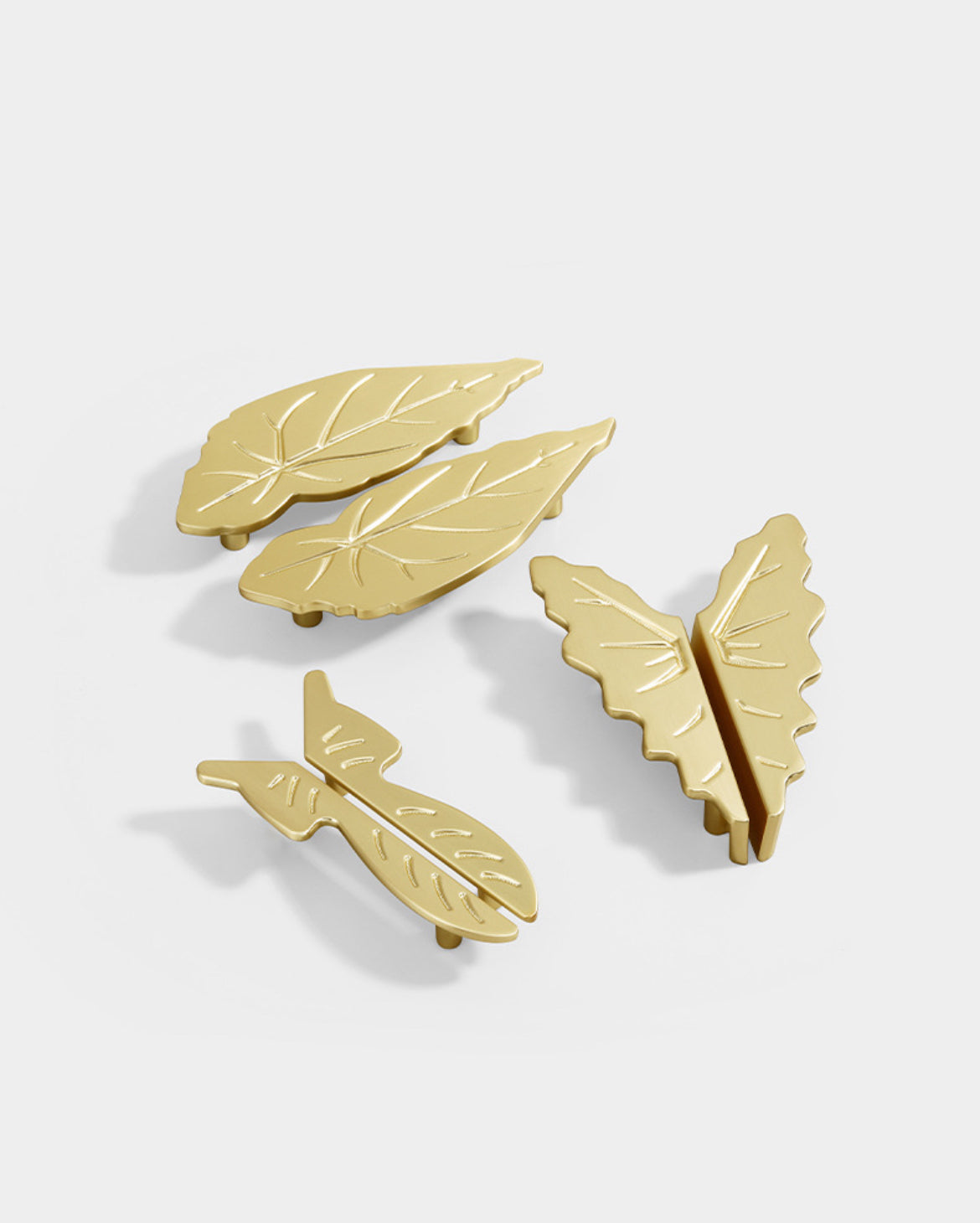 Brushed brass decorative kitchen handles with 2 1/2 inch and 3 3/4 inch hole spacing