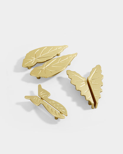 Brushed brass decorative kitchen handles with 2 1/2 inch and 3 3/4 inch hole spacing