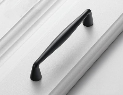 Black handle on a white surface