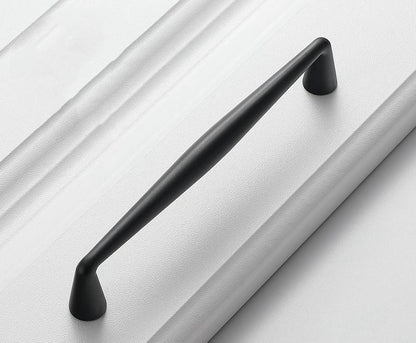 Black handle on a white surface