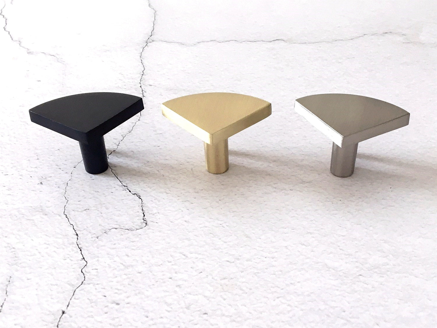 modern quarter moon knobs in black, gold and silver