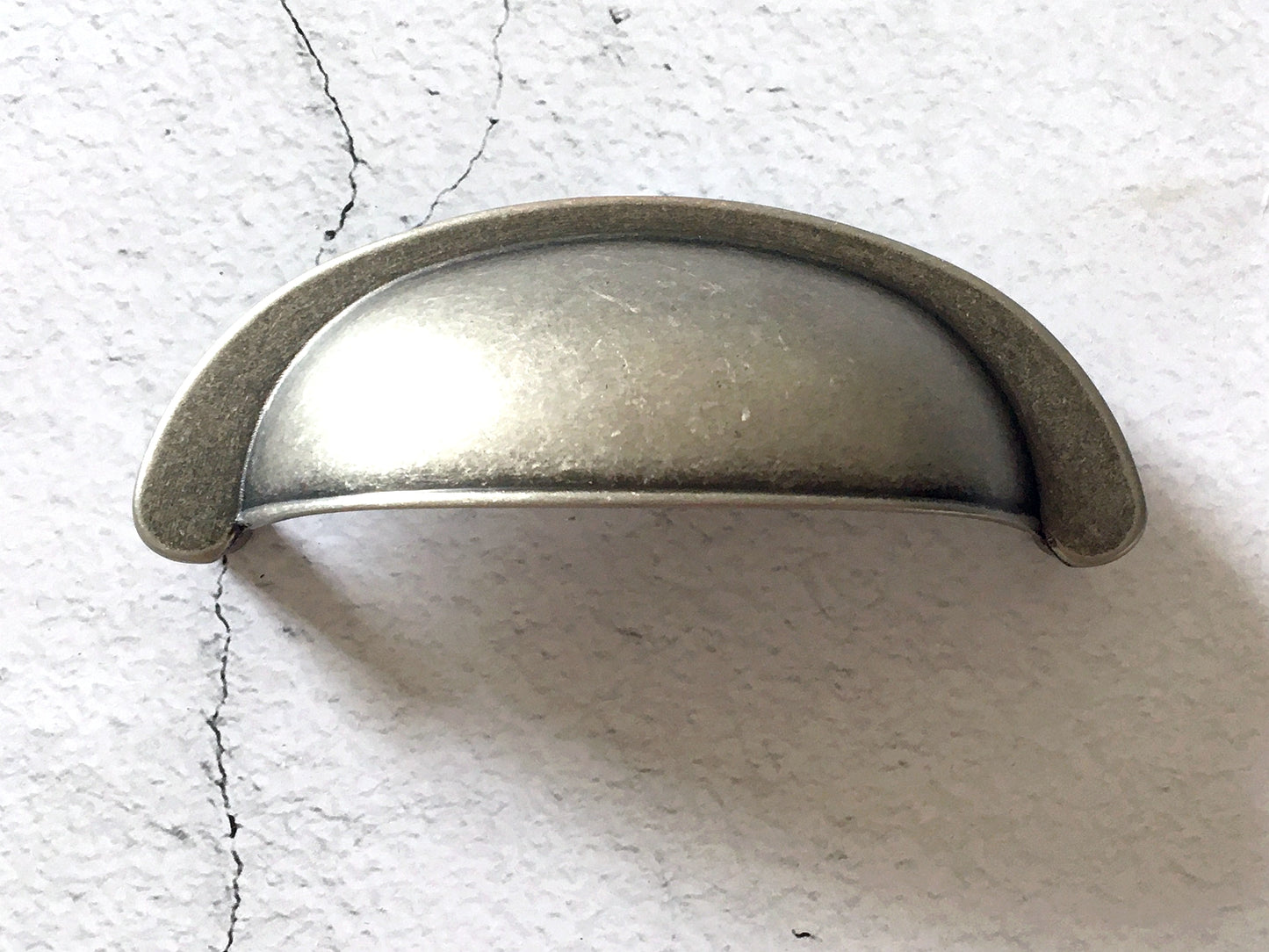 Pewter drawer cup pull with 3 inch hole spacing 