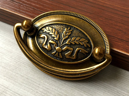 2.5" Centers Oval Plate Drawer Pull - Antique Gold Brass - LynnsHardware