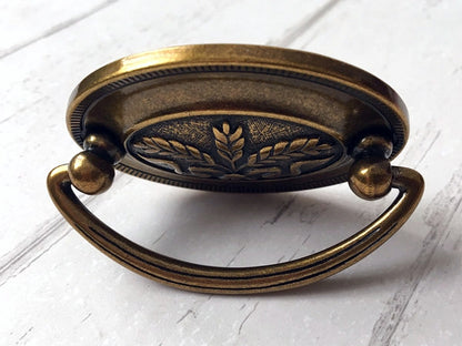 2.5" Centers Oval Plate Drawer Pull - Antique Gold Brass - LynnsHardware