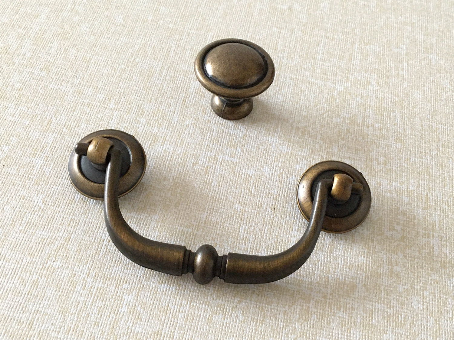 antique gold brass swing bail pull with matching round knob
