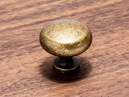 distressed, worn antique bronze round knob