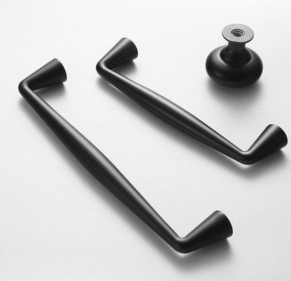Black door handles and a knob on a white background