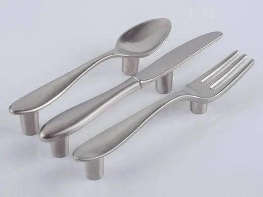 brushed nickel cutlery-shaped cabinet handles with 3-inch hole spacing