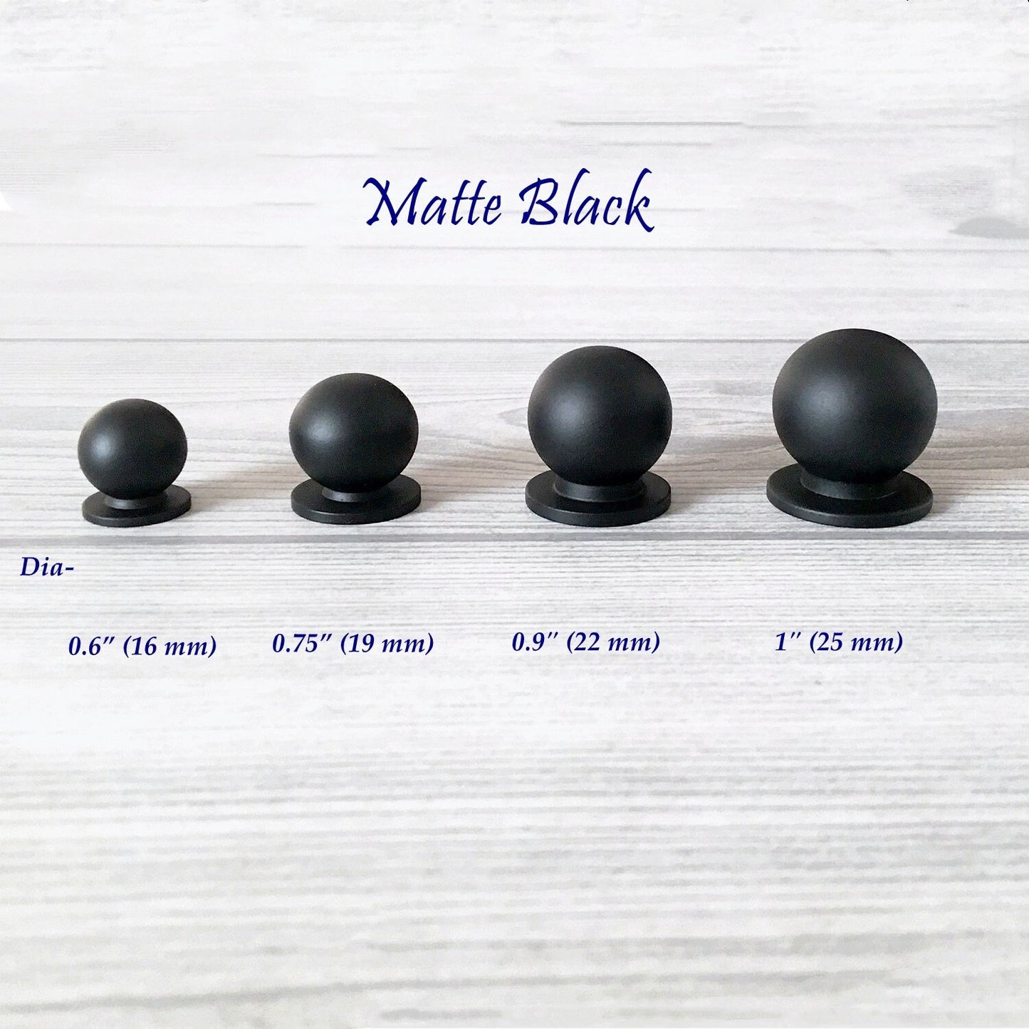 Set of four matte black spherical tiny knobs