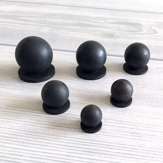 Set of matte black spherical knobs 