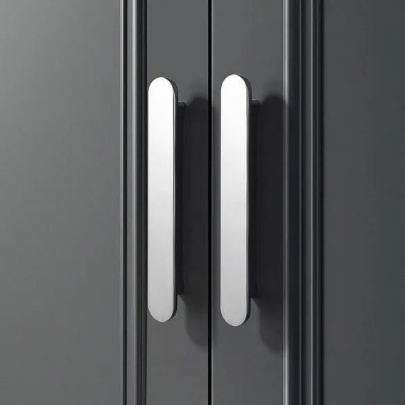 Close-up of a gray cabinet with silver handles