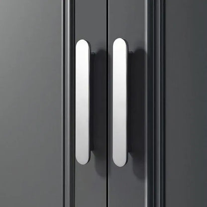 Close-up of a gray cabinet with silver handles