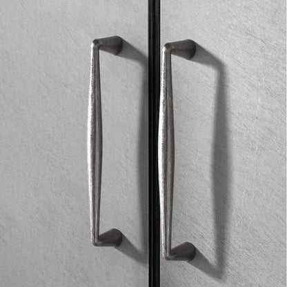 pewter drawer pulls on a cabinet